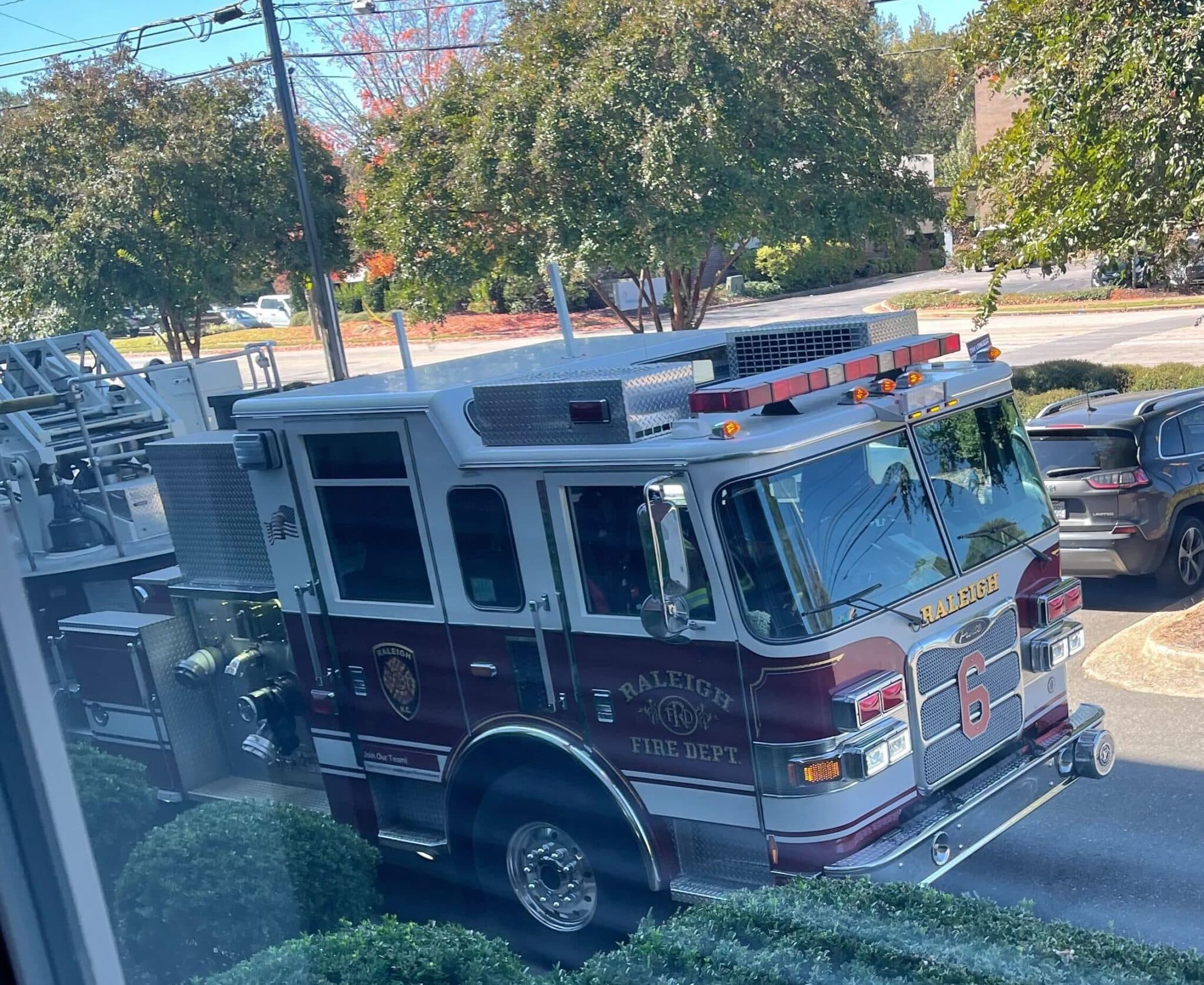 Firetruck outside of the office after an accidental dispatch from a medical alert system.