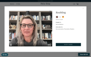 A woman using the Felix Gray virtual try-on feature to see how a pair of glasses looks.