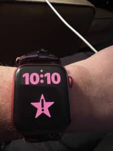 Apple Watch displaying time and enlarged Lively app icon
