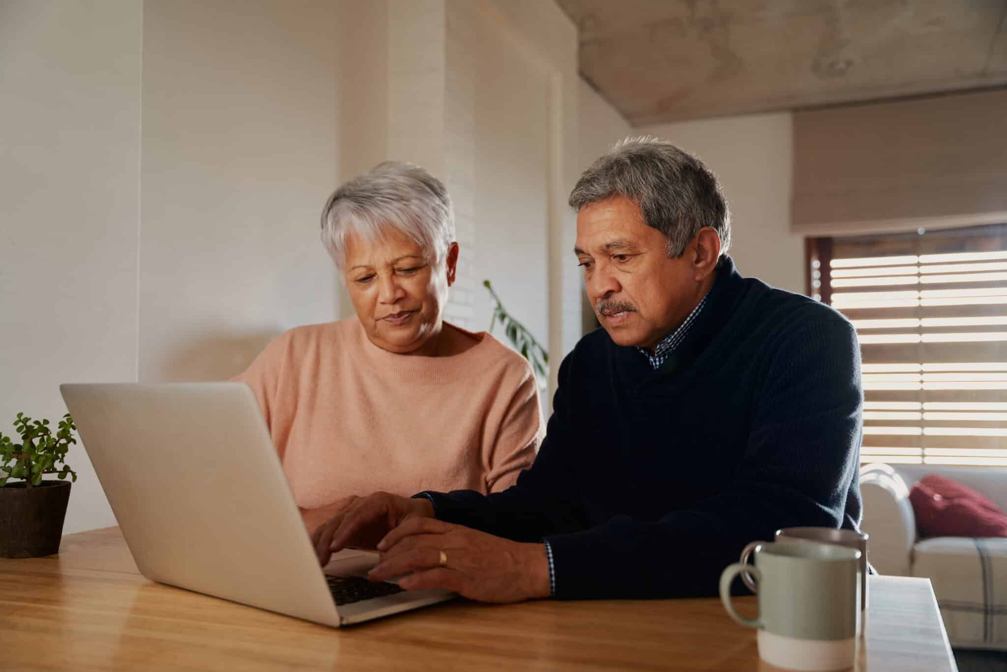 Couple creating a will online