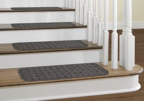 Fabric stair tread covers on each step of a staircase