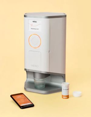 medication dispenser and cell phone displaying app