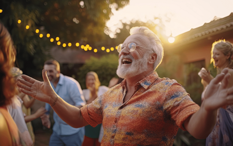Man smiling and dancing at a party
