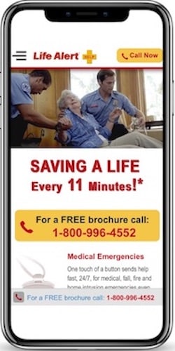 Life Alert mobile homepage with banner image of older women being helped by paramedics.