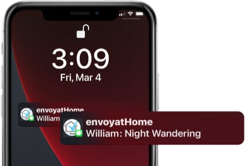 A smartphone displaying an EnvoyatHome notification