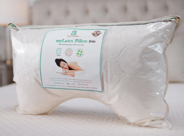 Contoured side sleeper pillow in packaging