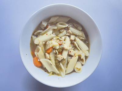 A bowl of chicken noodle soup