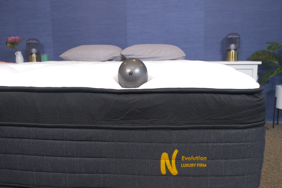 Weighted ball sits on the edge of the Nolah Evolution Luxury Firm 