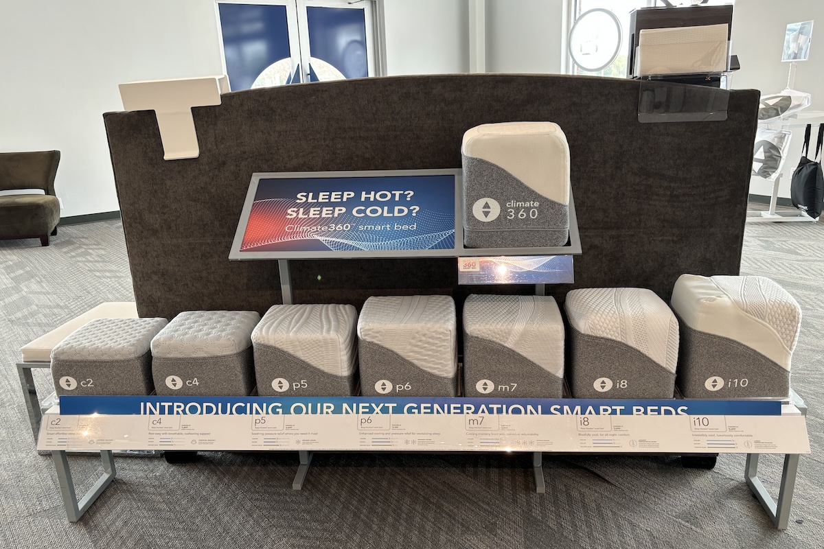  Sleep Number mattress samples shaped like blocks lined up next to each other in a Sleep Number showroom