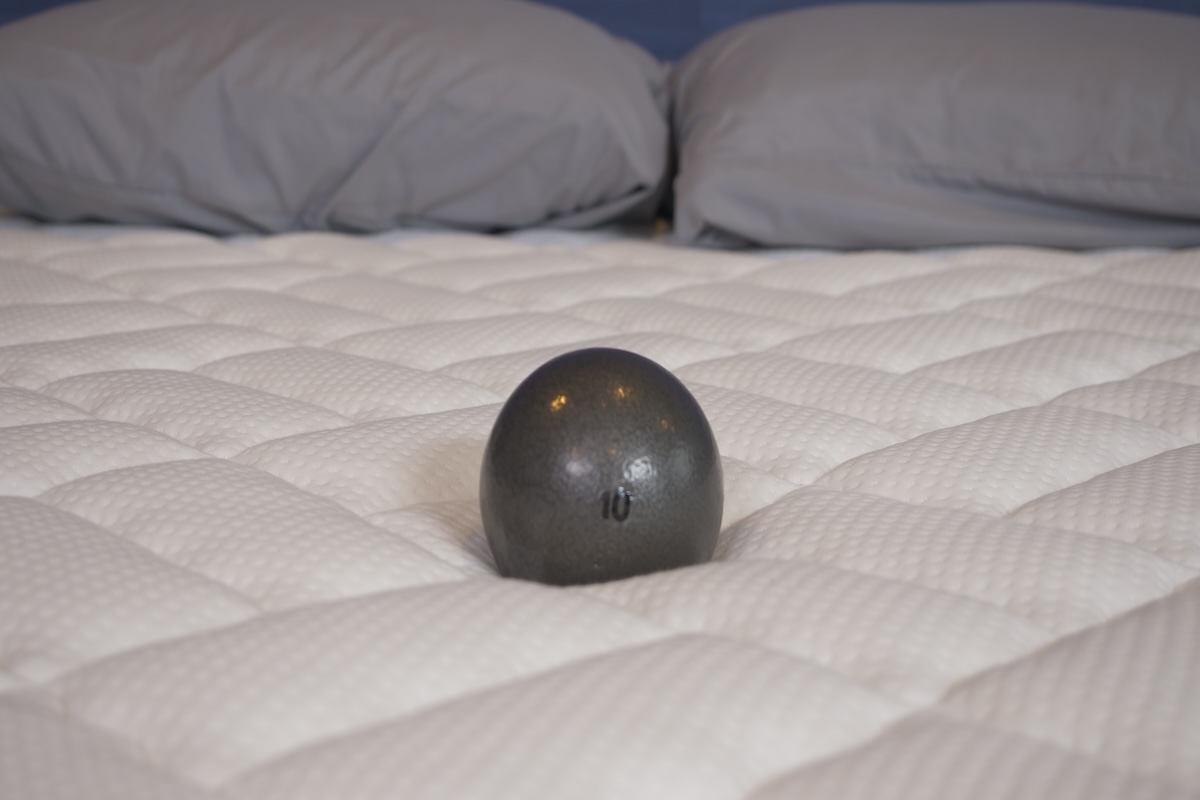 10-pound ball on a bare Titan Plus mattress with gray pillows