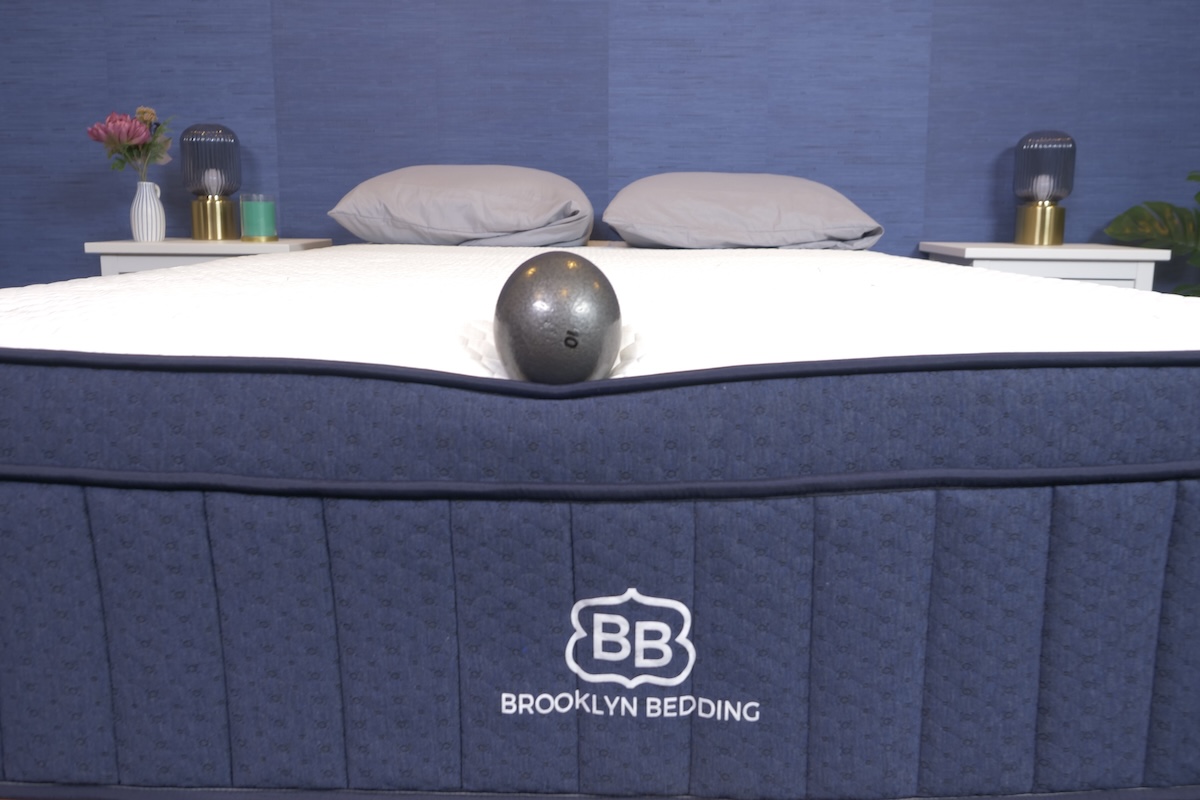  A 10-pound ball on the edge of a Brooklyn Bedding mattress 