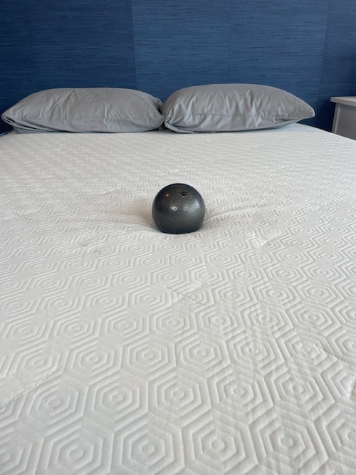 Weighted ball sits in the middle of the Bear Original mattress